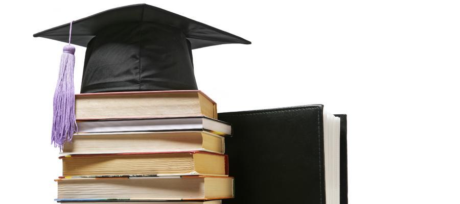 graduation hat and books
