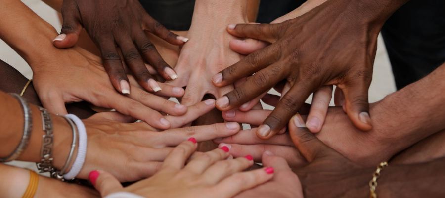hands of different people of colour